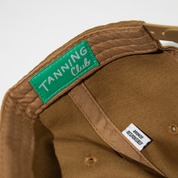 Brown baseball cap